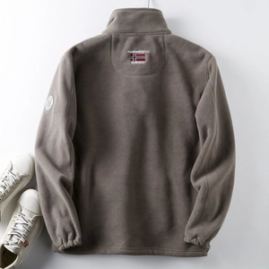 Rear view detail of taupe fleece jacket showing stand collar and Norway flag embroidery
