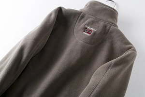 Detailed view of the double-layer fleece jacket with Norway flag and brand embroidery
