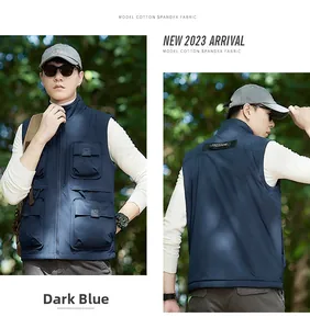 Detail of navy blue reversible fleece vest with multi-pockets and Freedom patch