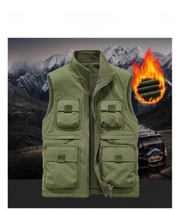 Detail view of military green utility vest showing multi-pocket design and fleece lining