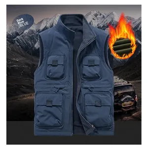 Detail of navy blue fleece-lined vest featuring windproof fabric and four functional pockets
