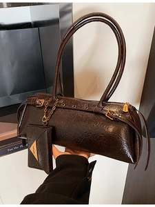 Retro dark brown cylinder underarm bag with pleated texture and stylish sub-bag