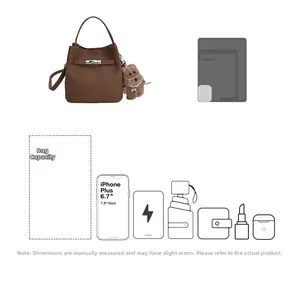 Brown lychee texture bucket bag showing internal capacity for phone and essentials