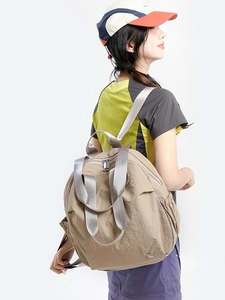 Stylish khaki high-capacity tote backpack for women with water-resistant nylon texture