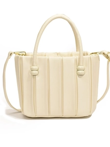 Creamy white pleated bucket tote bag with round handles and adjustable strap