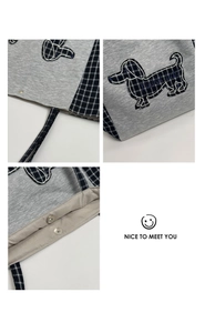 Détails du sac cabas en tricot gris avec fermoir magnétique et broderie teckel