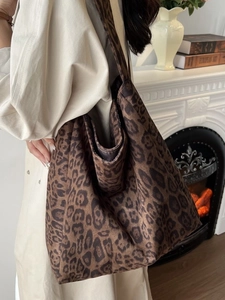 Retro leopard print tote bag with large capacity shown in a stylish home setting