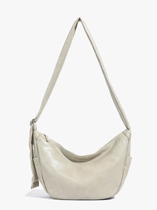 Retro light grey crescent hobo bag with adjustable strap and decorative side knots