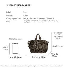 Size comparison of leopard print canvas tote bag with smartphone for scale