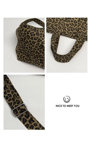Close-up of leopard print corduroy bag showing fine stitching and silver metal buckle