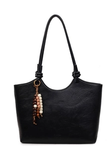 Minimalist black tote bag with textured faux leather and wooden bead tassel detail