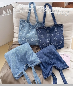 Detailed collection of denim tote bags in blue washes with star and heart patterns