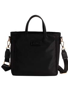 Versatile black nylon bucket bag with dual handles and wide adjustable shoulder strap