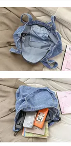 Interior view of denim tote bag with heart pattern showing large capacity for essentials