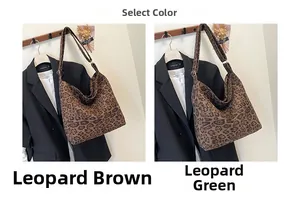 Detail view of large leopard print tote bags in brown and green canvas material
