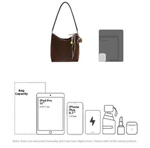 Brown suede tote bag capacity test showing storage for 11 inch iPad and accessories
