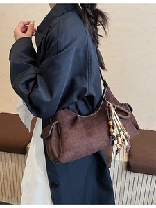 Brown faux suede hobo bag with bohemian colorful bead tassels and large side pocket