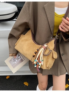 Retro mustard suede crossbody bag with ethnic tassels and large capacity bohemian design