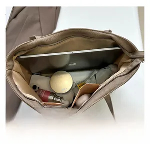Top view of the brown lychee pattern tote bag showing large internal capacity with essentials