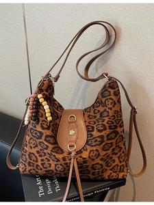 Retro leopard print tote bag with brown leather straps and vintage beaded charm