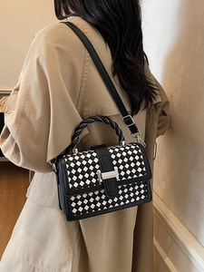 Chic black and white checkerboard square bag with woven handle and metallic H-buckle