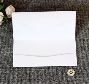 Detailed interior of white tri-fold invitation with kraft rope and card slots