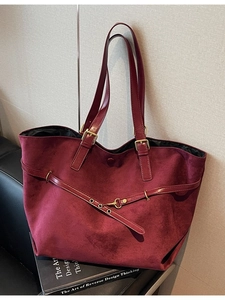 Vintage burgundy matte tote bag with smooth leather straps and gold hardware detail
