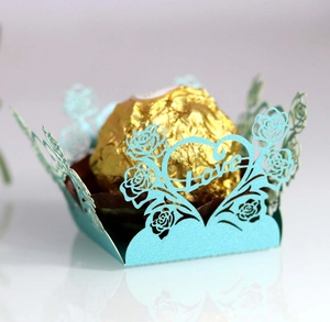 Laser-cut pearl blue chocolate wrapper featuring rose patterns and Love lettering
