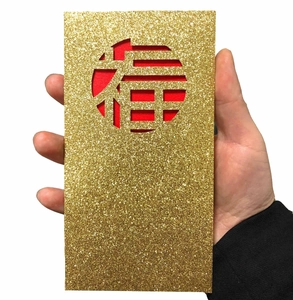 Enveloppe rouge à paillettes dorées avec caractère chinois Fu pour le Nouvel An