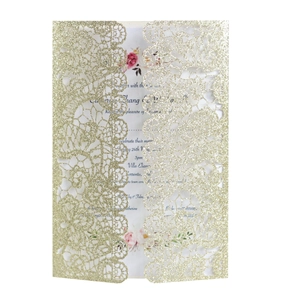 Detailed laser cut lace wedding invitation with gold glitter and floral inner card