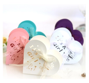 Laser-cut heart gift boxes with 'It's a Girl' text and satin ribbon for baby shower