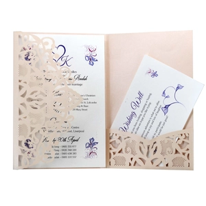 Faire-part de mariage doré découpé au laser avec motifs floraux et carte RSVP