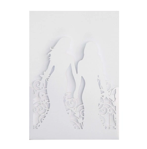 Detail of laser-cut wedding invitation featuring two girls silhouette on white cardstock