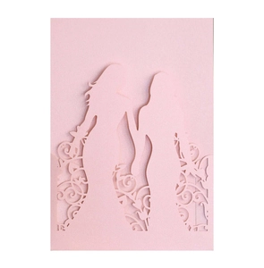 Intricate laser-cut pink wedding invitation with elegant girls and floral silhouette