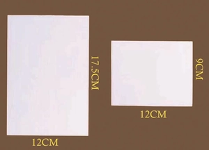Detailed size comparison of laser-cut Christmas invitation cards in white glitter paper