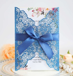 Navy blue laser cut wedding invitation with glitter finish and elegant silk bow tie
