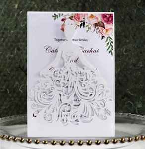 Laser cut wedding invitation featuring bridal silhouette and floral inner card design