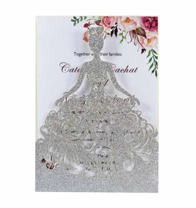 Elegant laser cut wedding invitation with silver glitter finish and floral interior card