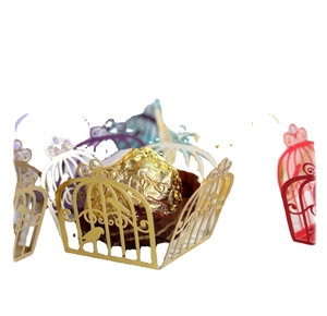 Laser-cut birdcage candy boxes in metallic colors for wedding chocolate decoration