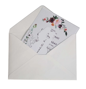 Detailed laser-cut hollow pattern and vintage red floral print on an invitation card set
