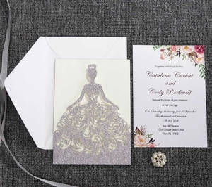 Detailed laser cut wedding invitation with glitter silver bridal silhouette and floral card