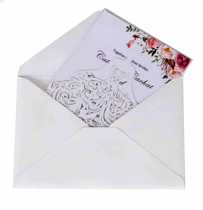 Elegant laser cut wedding invitation set with white envelope and floral inner card