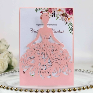 Laser-cut wedding invitation featuring pink princess dress cover and floral inner card