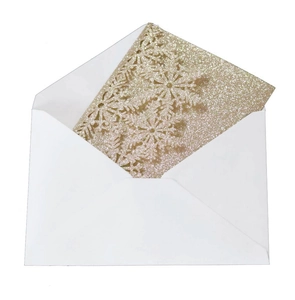Laser-cut champagne gold snowflake greeting card with white envelope for Christmas