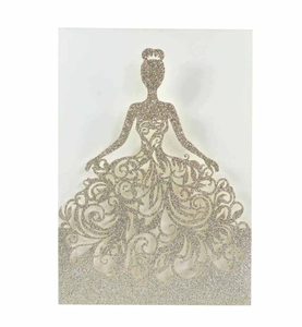 Intricate laser-cut champagne gold glitter cardstock silhouette with floral swirl patterns