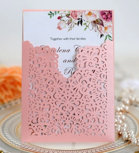 Laser cut floral invitation card with pink pearl finish and elegant floral inner sheet
