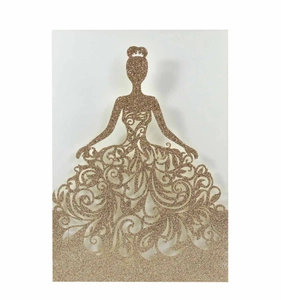 Detail of laser-cut glitter paper card featuring an elegant bridal silhouette and patterns