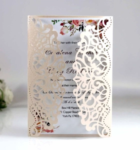 Detailed laser cut champagne lace wedding invitation with floral inner card inserts