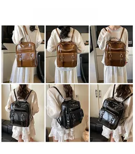 Detail showing shiny leather backpacks with multi-zipper pockets and buckle design