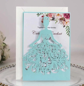Detailed laser cut wedding invitation with bride silhouette and white envelope set